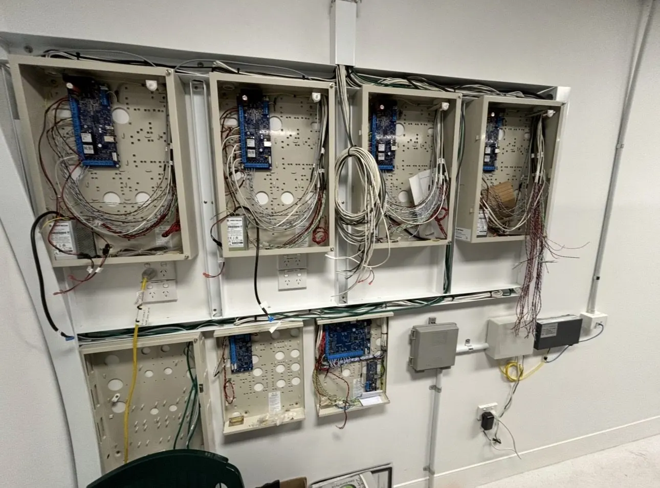 Overhead cable tray installed across a warehouse ceiling