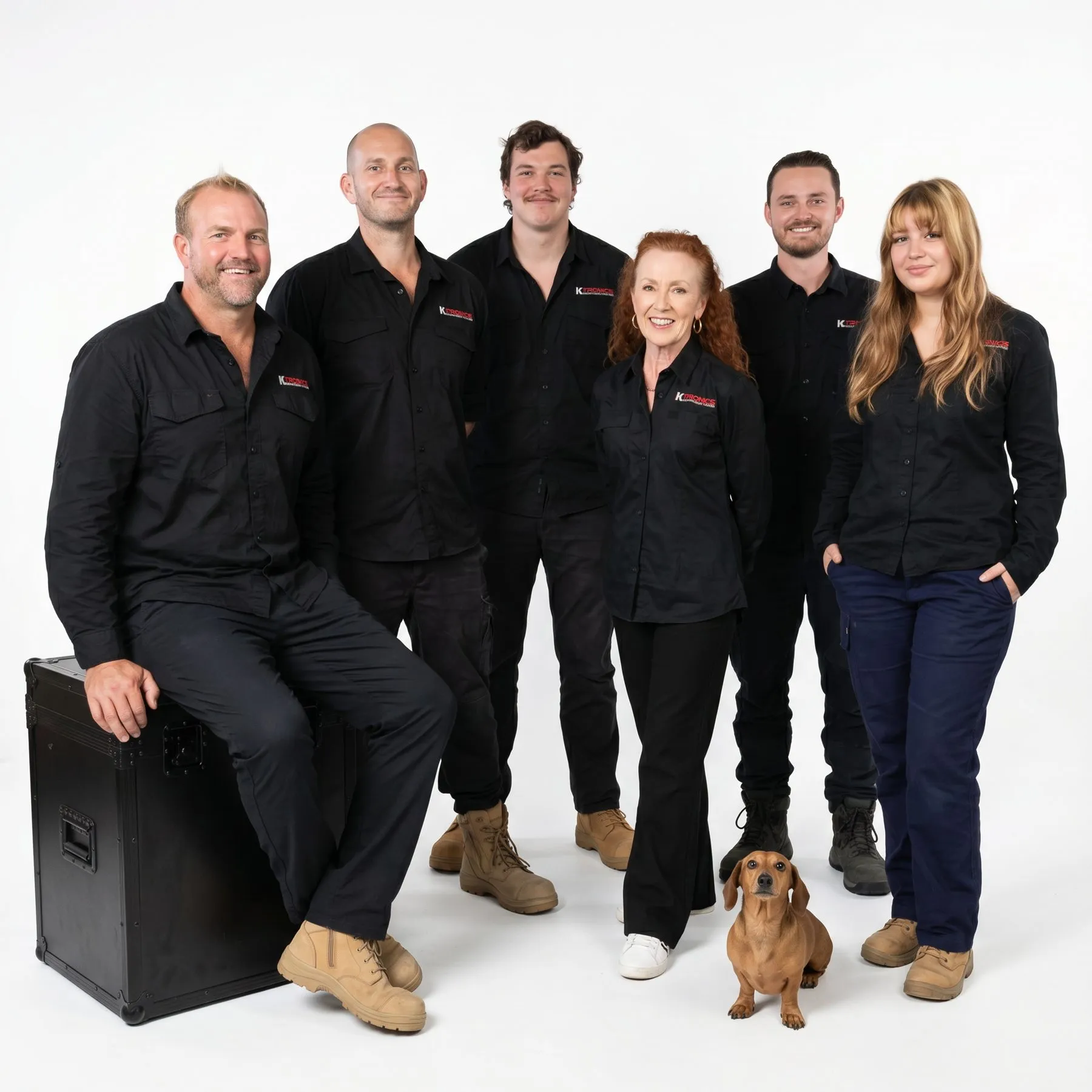 The Ktronics team. Sydney commercial electronic security specialists, photographed at the Brookvale workshop in 2026.
